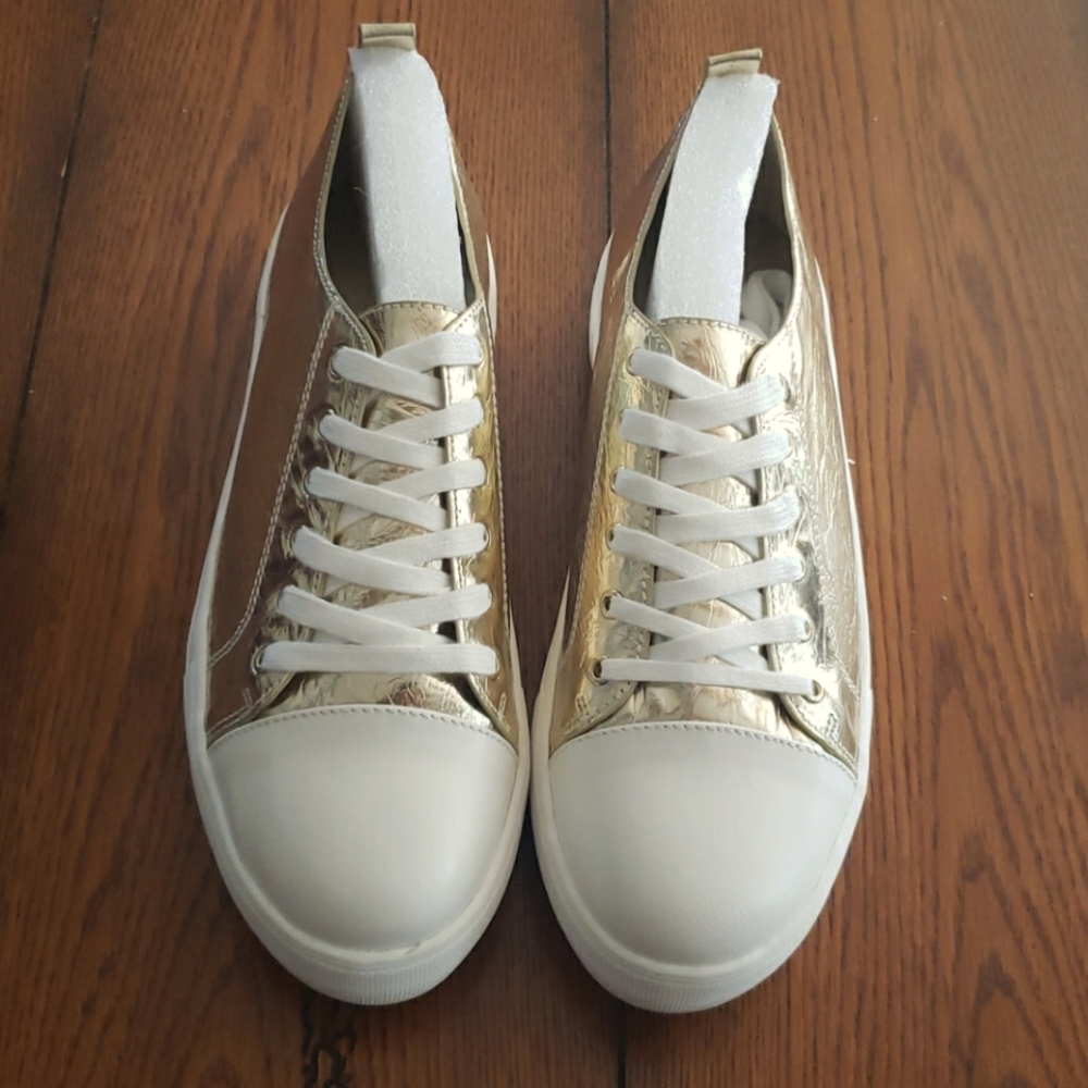 Gold sneakers never worn